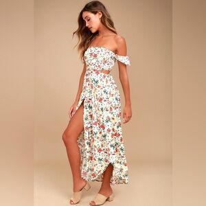 Lulu's Floral Maxi Dress with side waist cut out. Double front leg slits.